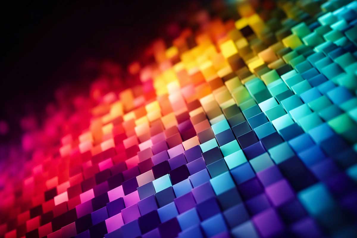 A vibrant mosaic of small, 3D rectangular blocks in a gradient of colors ranging from deep blues and purples to bright reds, oranges, and yellows creates a visually dynamic, textured pattern. The overall effect is a colorful, abstract digital artwork that feels almost like an improv dance of hues.