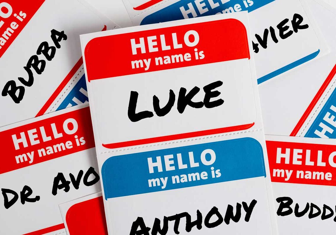 A collection of name tags, each with the header "HELLO my name is." The tag in the center displays the name "LUKE," while other tags around it show names such as "Bubba," "Xavier," "Dr. Avonte," "Anthony," and "Buddy." This playful array can be used for social therapeutic improv sessions.